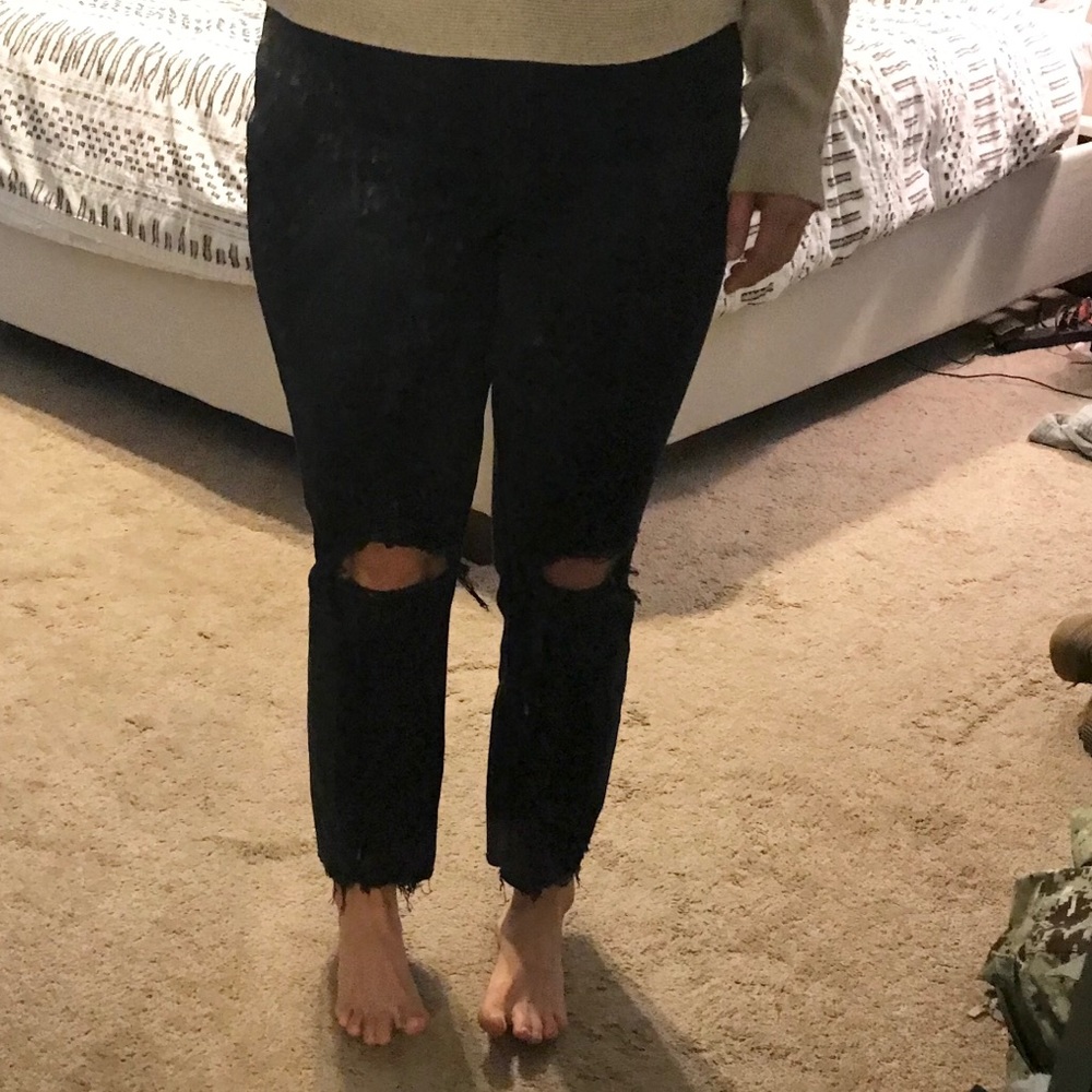 Higher-rise distressed mom jeans